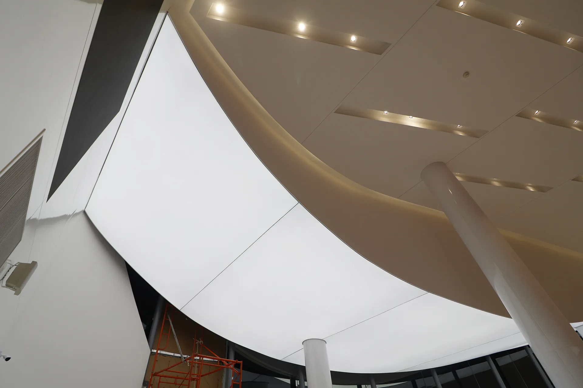 Custom stretch ceiling with architectural lighting